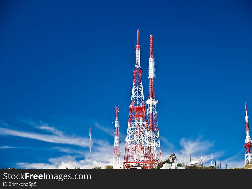 Communication towers on Mexican hillside