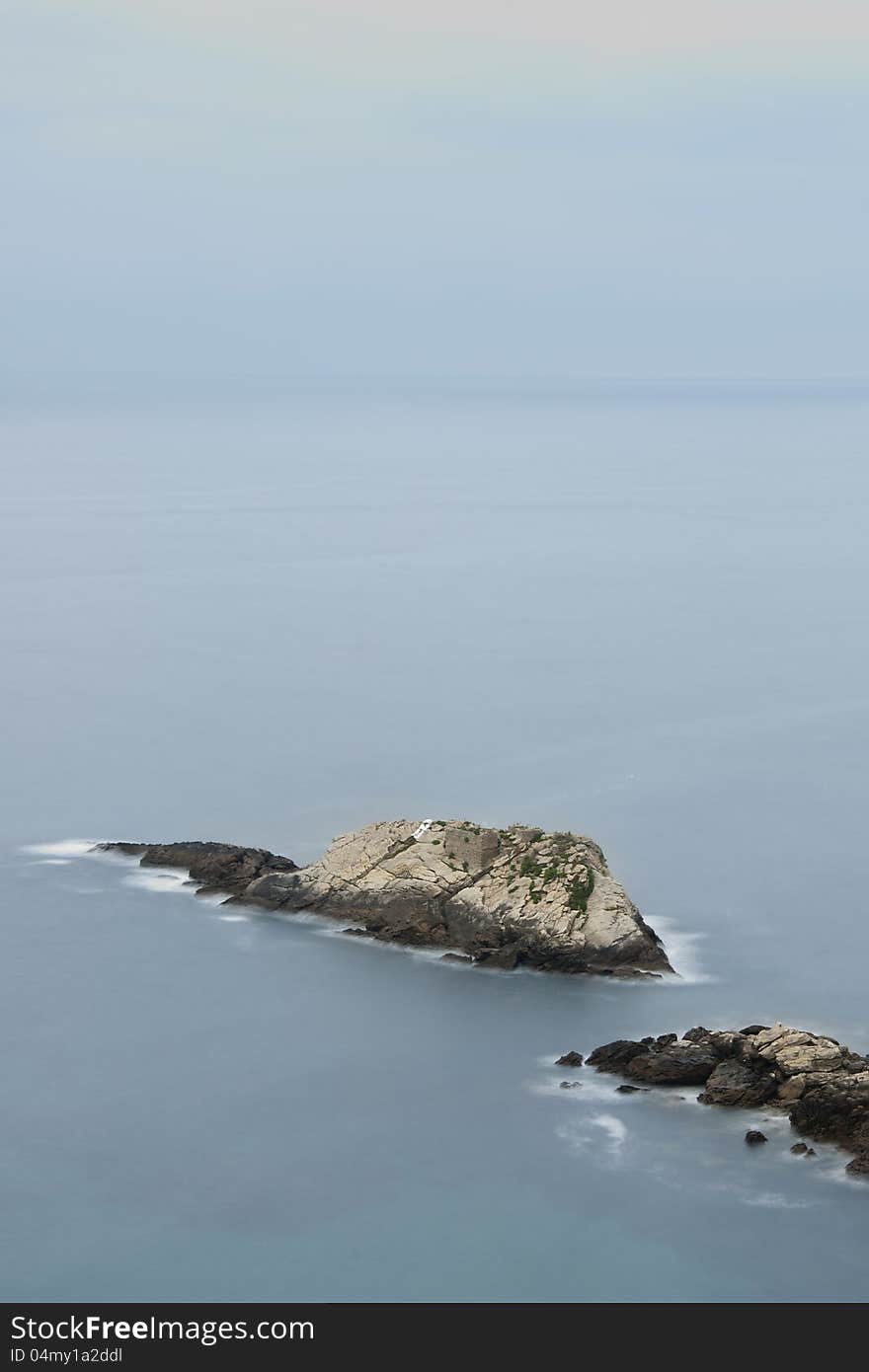 Bird eye view of Mollarri islet in Zarautz at dawn