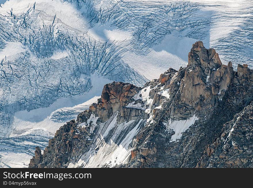 Rock against the Glacier of Mont Blanc near Chamonix in France.