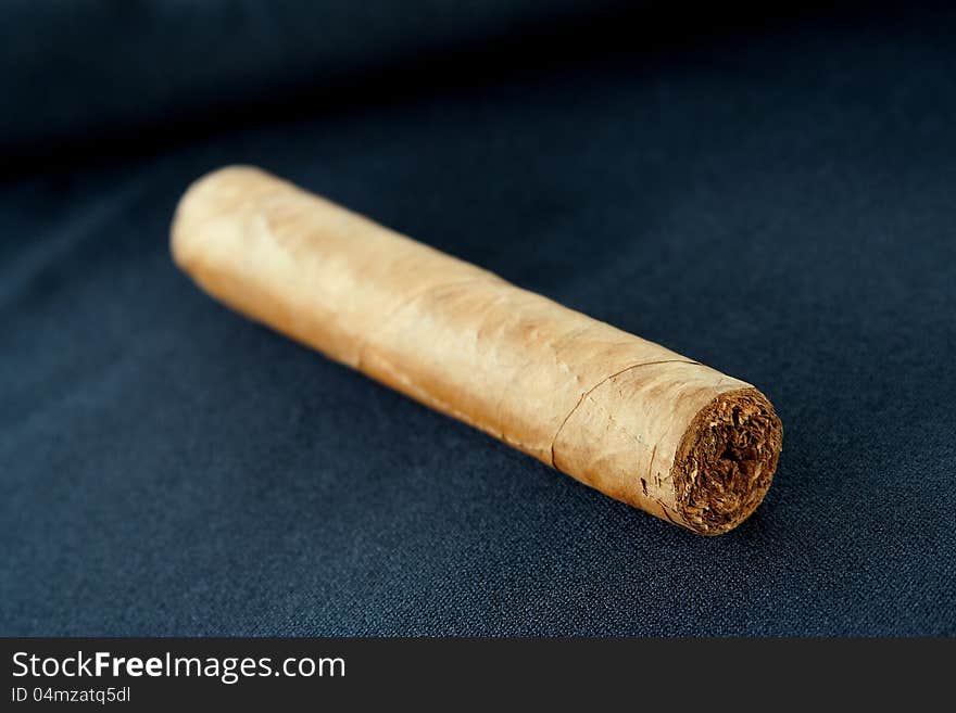 A cigar on a black background