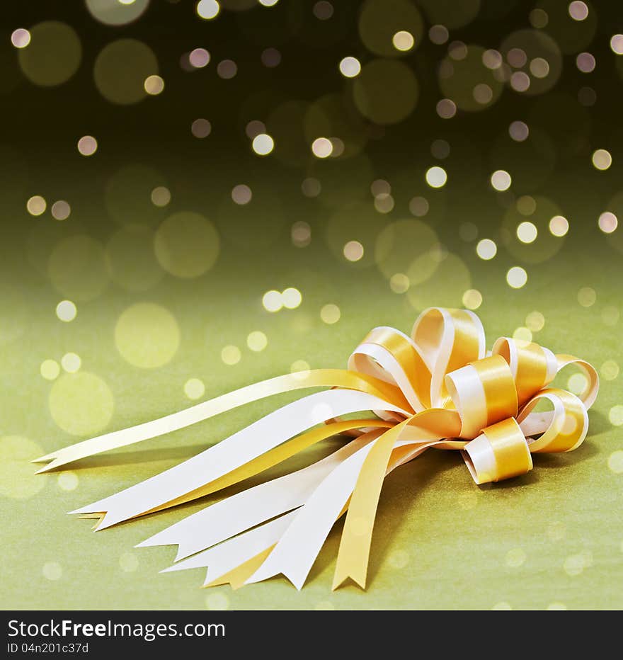 Gift golden ribbon and bow. Gift golden ribbon and bow