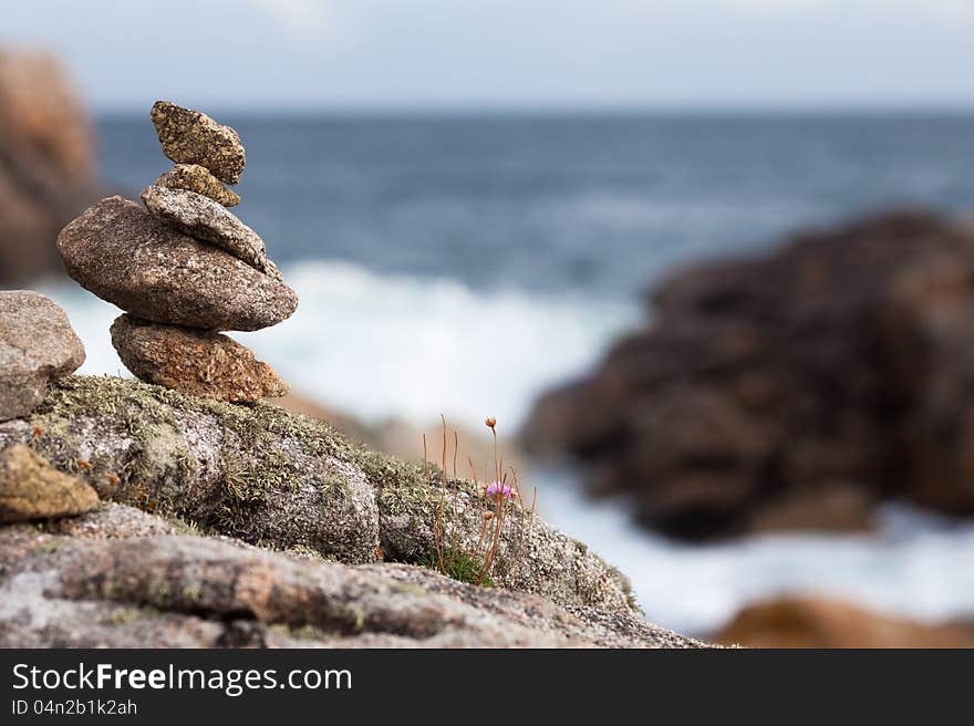 Stone Pile At The Rocky Coast