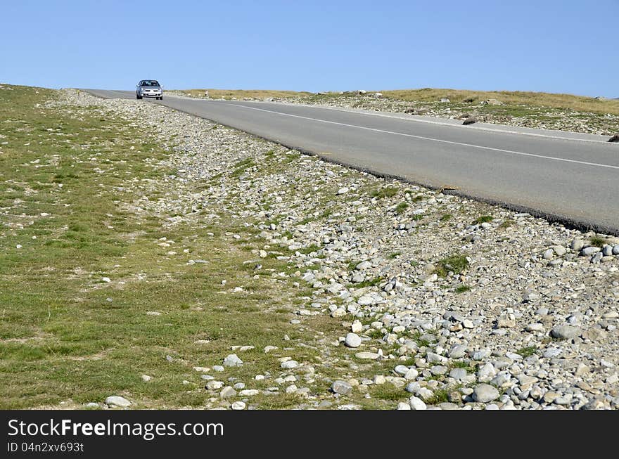 Curved road recently constructed to Padina, Bolboci, Pestera chalets in Bucegi mountains near Bucharest, Sinaia, Ploiesti and Brasov city in Romania. Curved road recently constructed to Padina, Bolboci, Pestera chalets in Bucegi mountains near Bucharest, Sinaia, Ploiesti and Brasov city in Romania