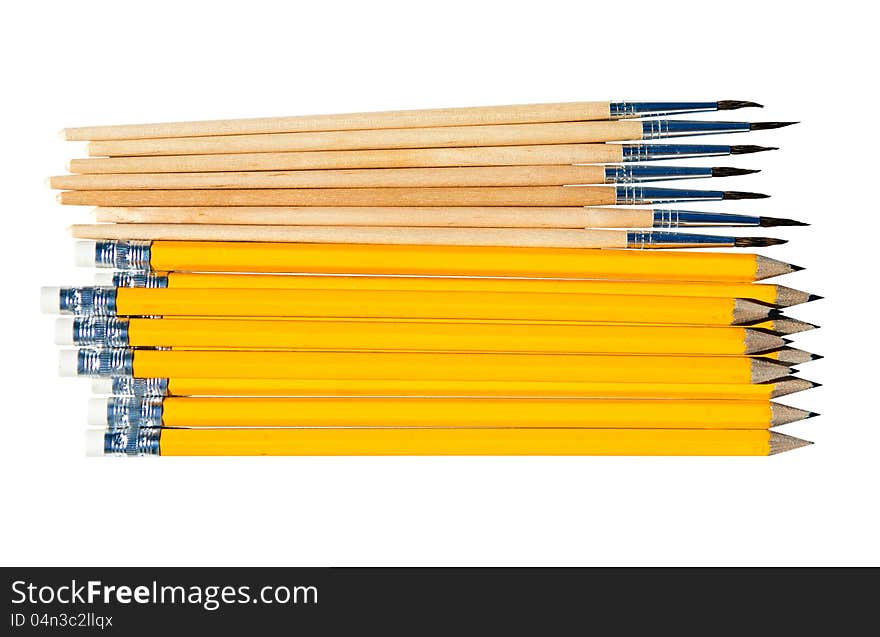 Pencils and brushes isolated on white background