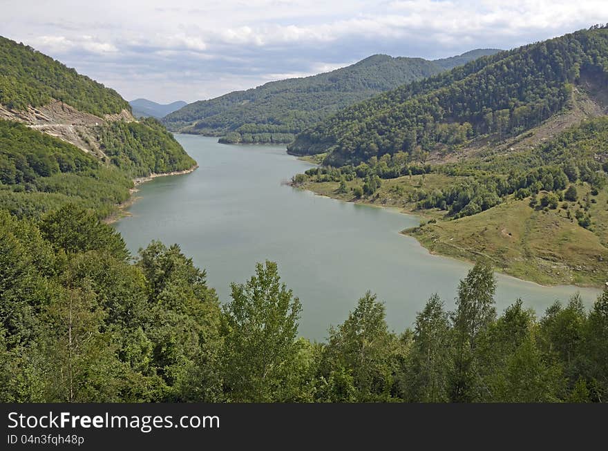 Siriu valley in Romania in Carpathian mountains is a touristic attraction. Siriu valley in Romania in Carpathian mountains is a touristic attraction.