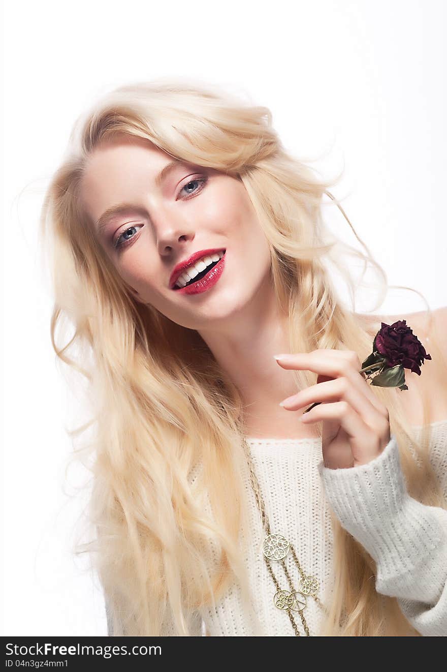 Attractive caucasian smiling woman blonde isolated on white with flower - red rose. Attractive caucasian smiling woman blonde isolated on white with flower - red rose