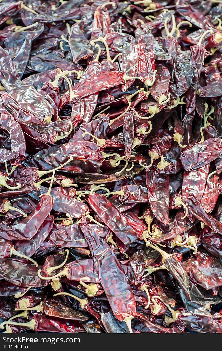 Batch of whole, dried hot peppers from above. Batch of whole, dried hot peppers from above