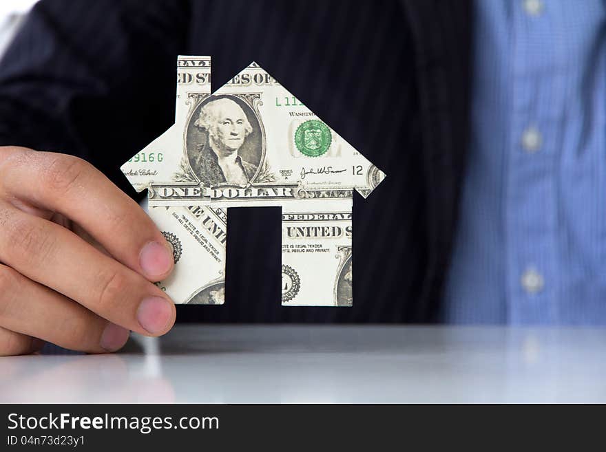 Business man business man holding banknote house icon. Business man business man holding banknote house icon