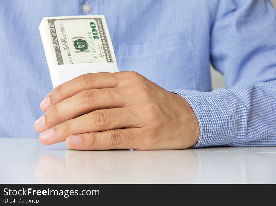 Image of hand hold money