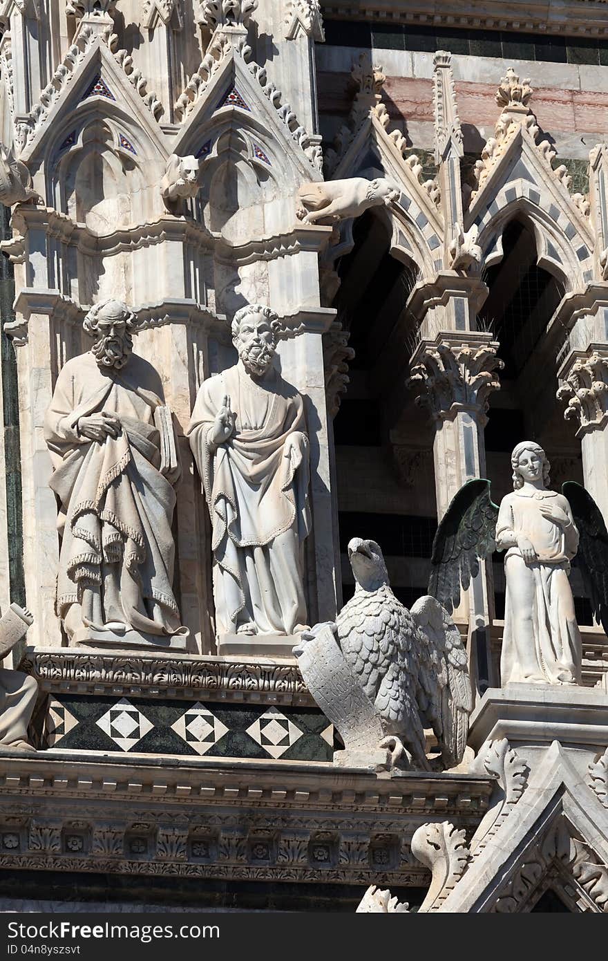 Statues decorating the facade of the Cathedral of Siena, Italy. Statues decorating the facade of the Cathedral of Siena, Italy