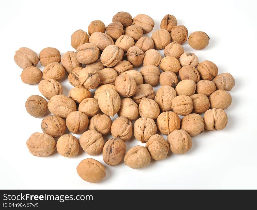 Brown walnuts  on white background