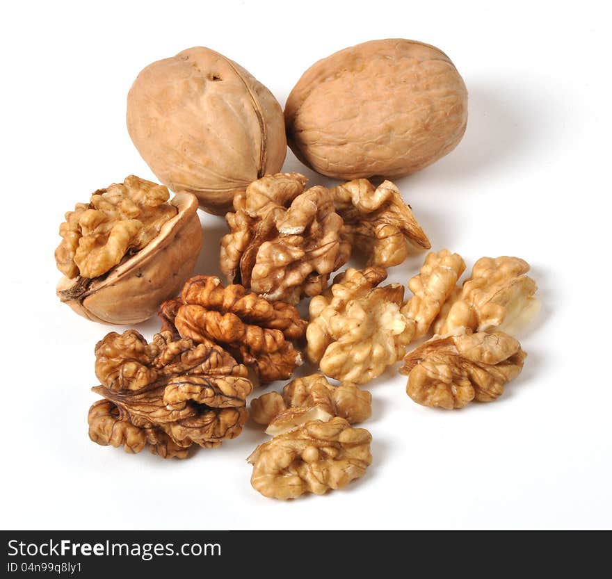 Brown walnuts  on white background