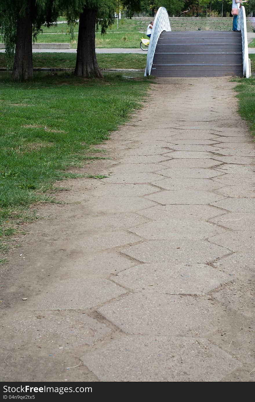 Pedestrian path in a city park. Pedestrian path in a city park