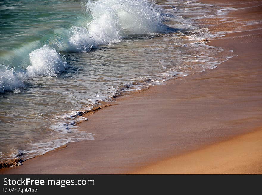 Waves  Retreating on Sandy Beach