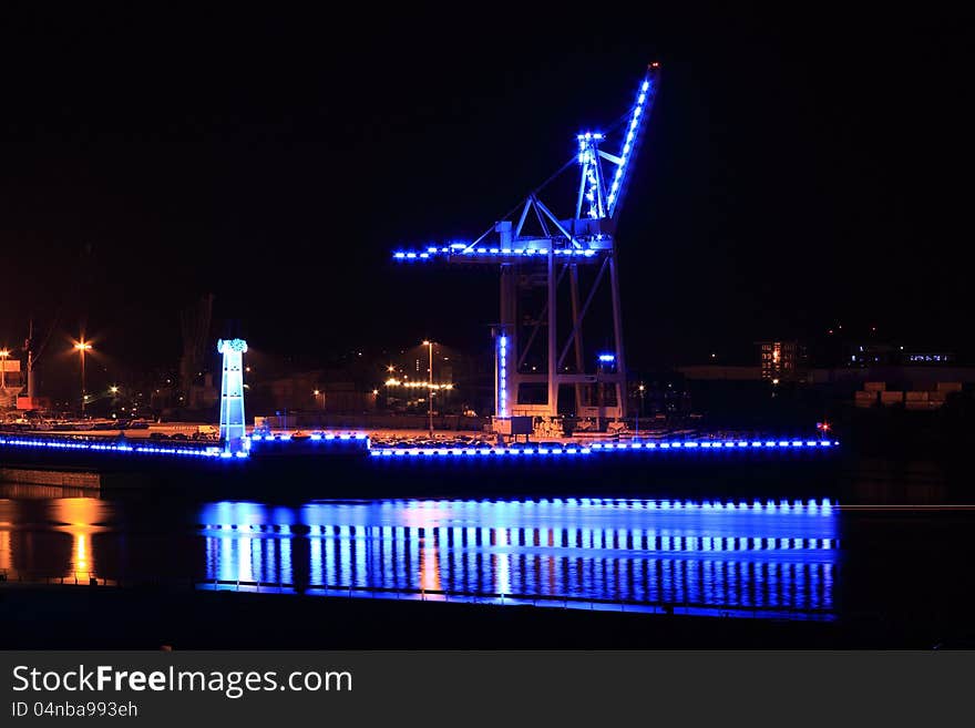 Blue industrial plant at night in port of Hamburg. Blue industrial plant at night in port of Hamburg.