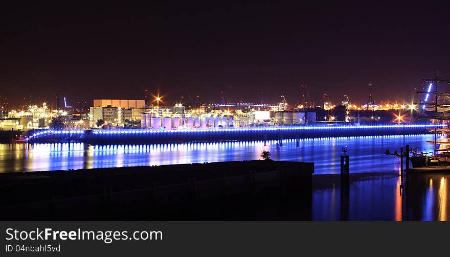 Blue industrial plant at night in port of Hamburg. Blue industrial plant at night in port of Hamburg.