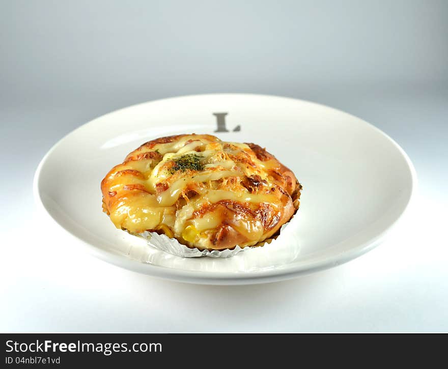 Bread bakes with dried shredded pork, mayonnaise, bacon, cheese and sweet corn. Bread bakes with dried shredded pork, mayonnaise, bacon, cheese and sweet corn