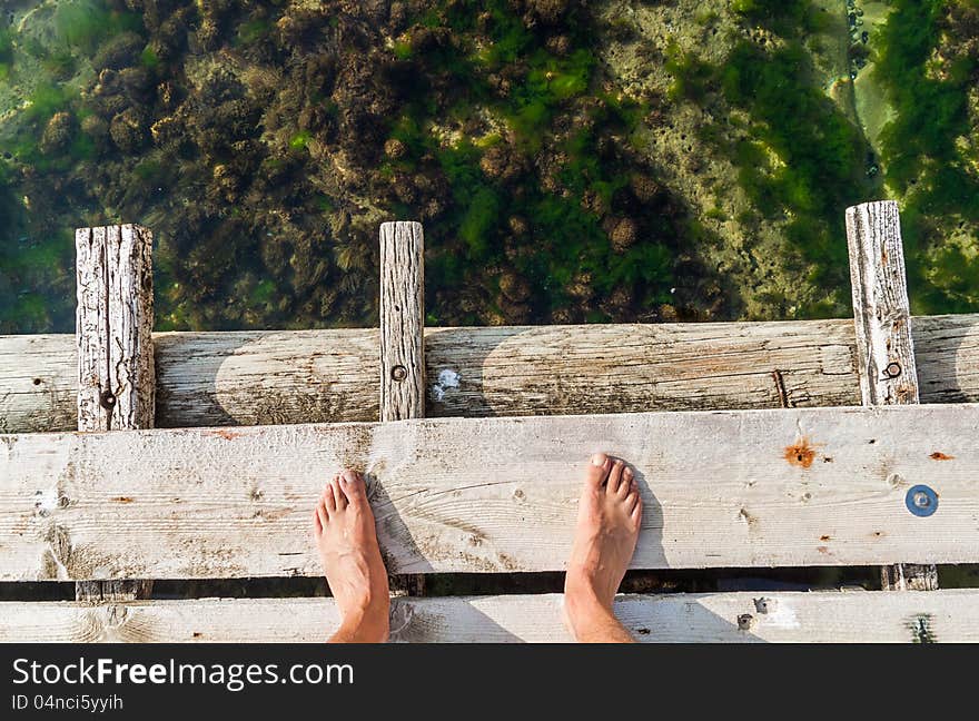 Standing on a bridge