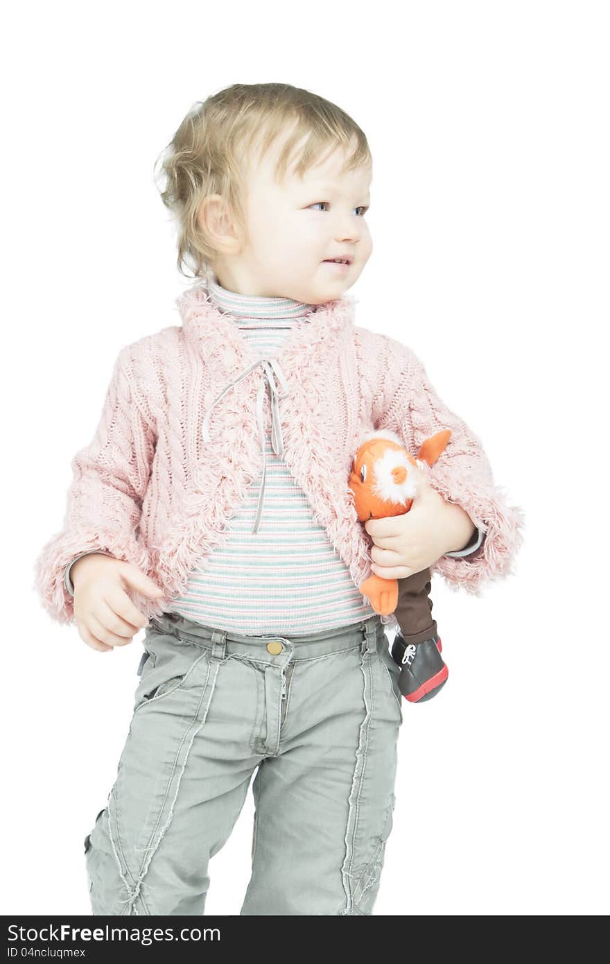 Portrait of little smiling toddler with toy