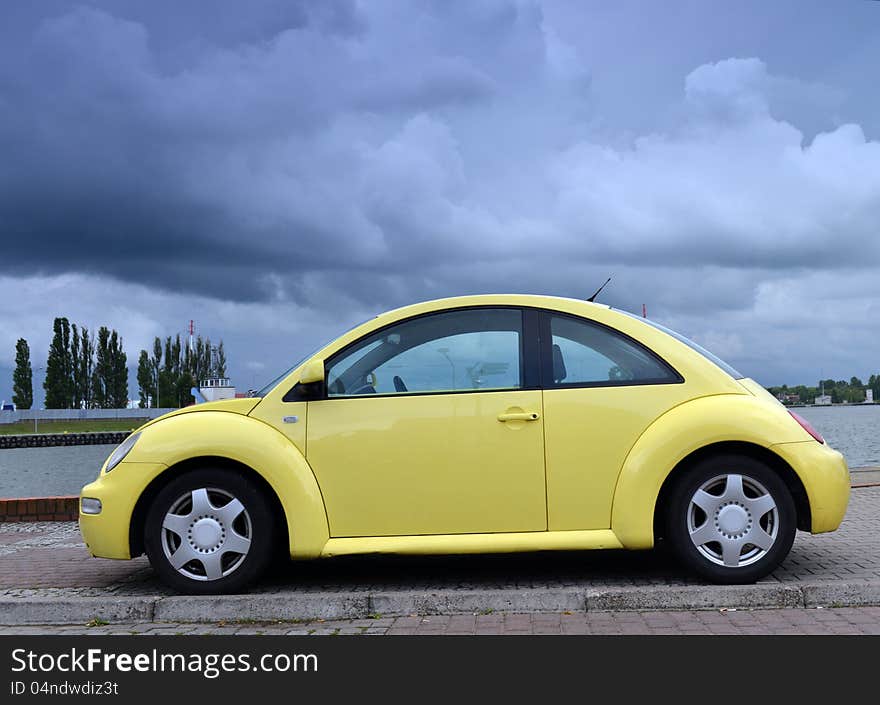 Yellow Family Car On Road