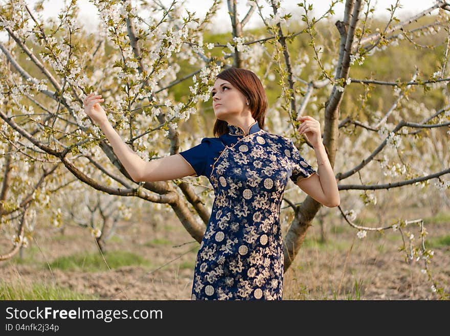 Girl and flowerses of the cherry. Girl and flowerses of the cherry