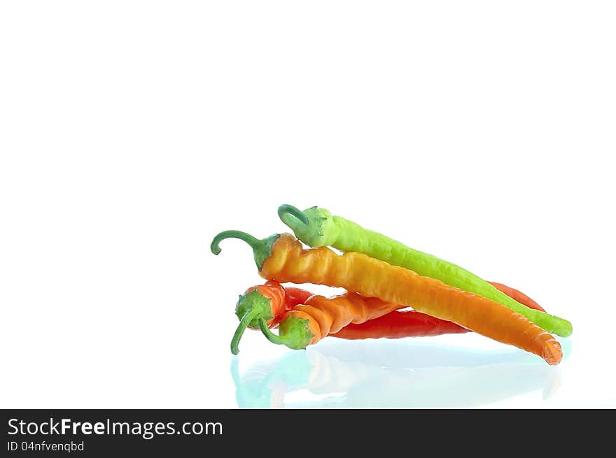 Hot pepper lying on a white background