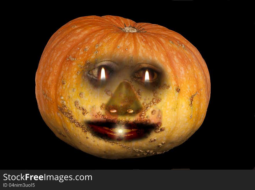 Natural, home-grown pumpkin isolated on black background. Face drawn on pumpkin as it is cut out on halloween. Natural, home-grown pumpkin isolated on black background. Face drawn on pumpkin as it is cut out on halloween.