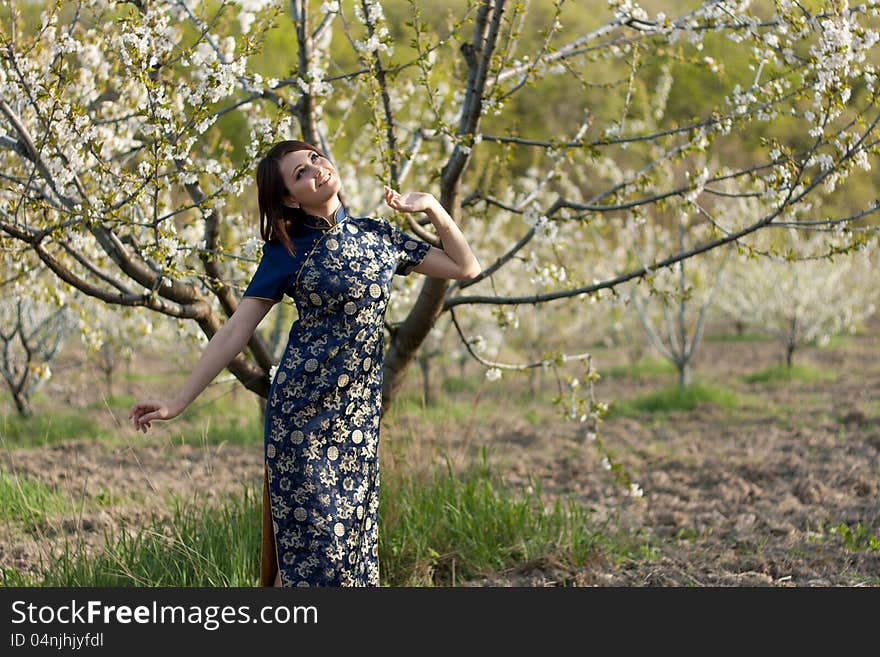 Girl and flowerses of the cherry. Girl and flowerses of the cherry