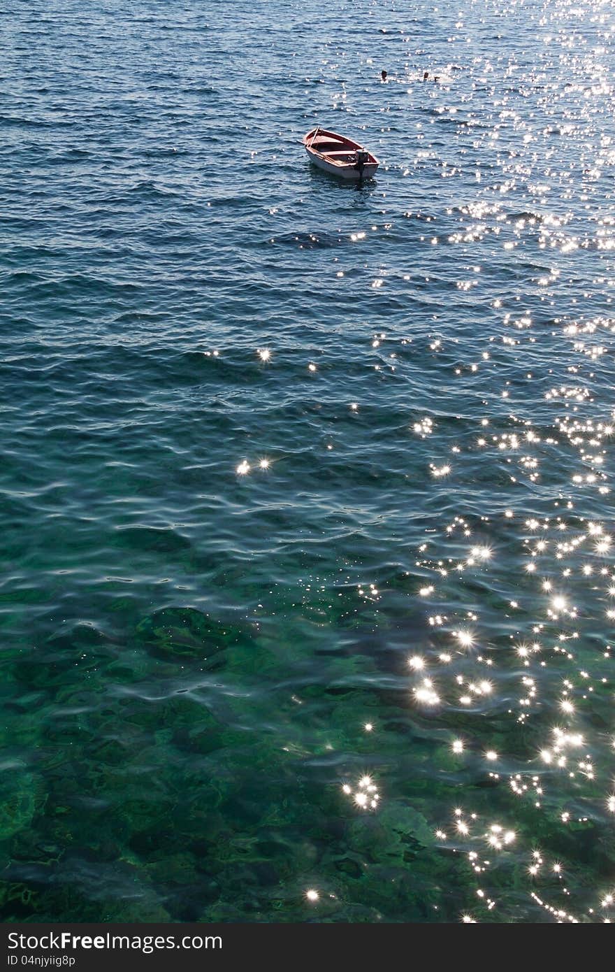 Lonely rowing boat, early morning