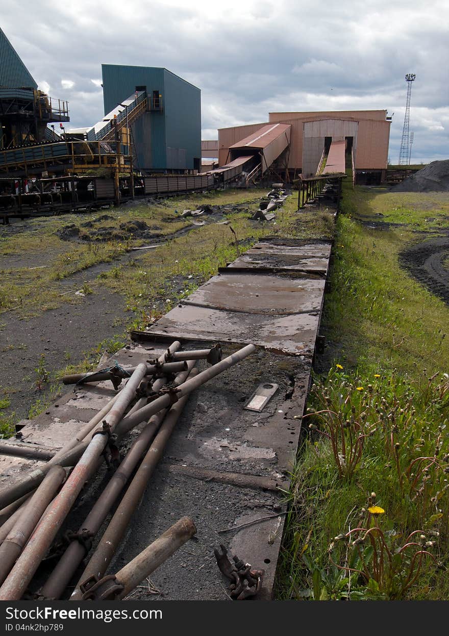 Old industrial conveyor belts and buildings. Old industrial conveyor belts and buildings