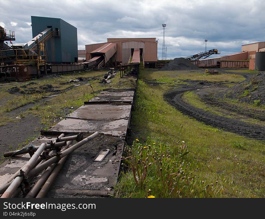 Old industrial conveyor belts and buildings. Old industrial conveyor belts and buildings