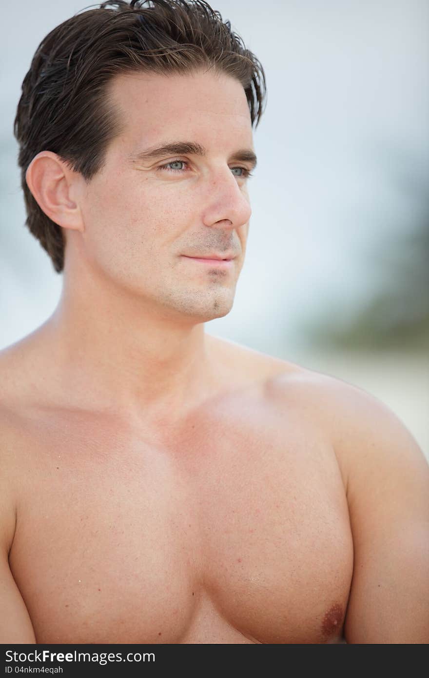 Headshot of a handsome man outdoors