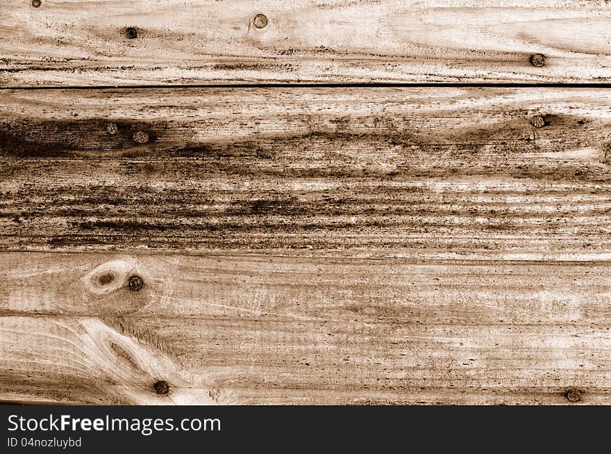 Old grungy wooden background. Sepia