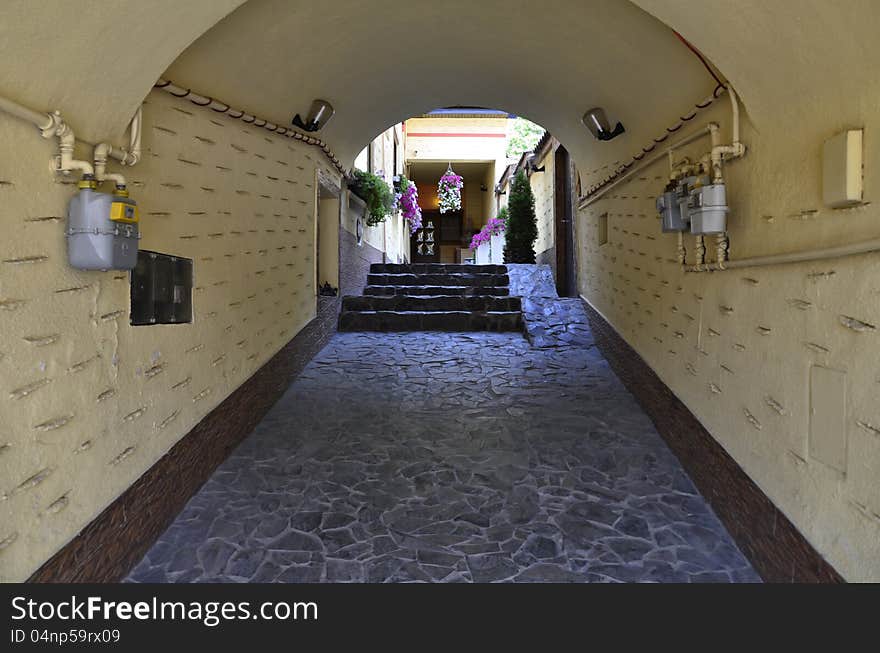 Narrow street tunnel to interior garden. Narrow street tunnel to interior garden