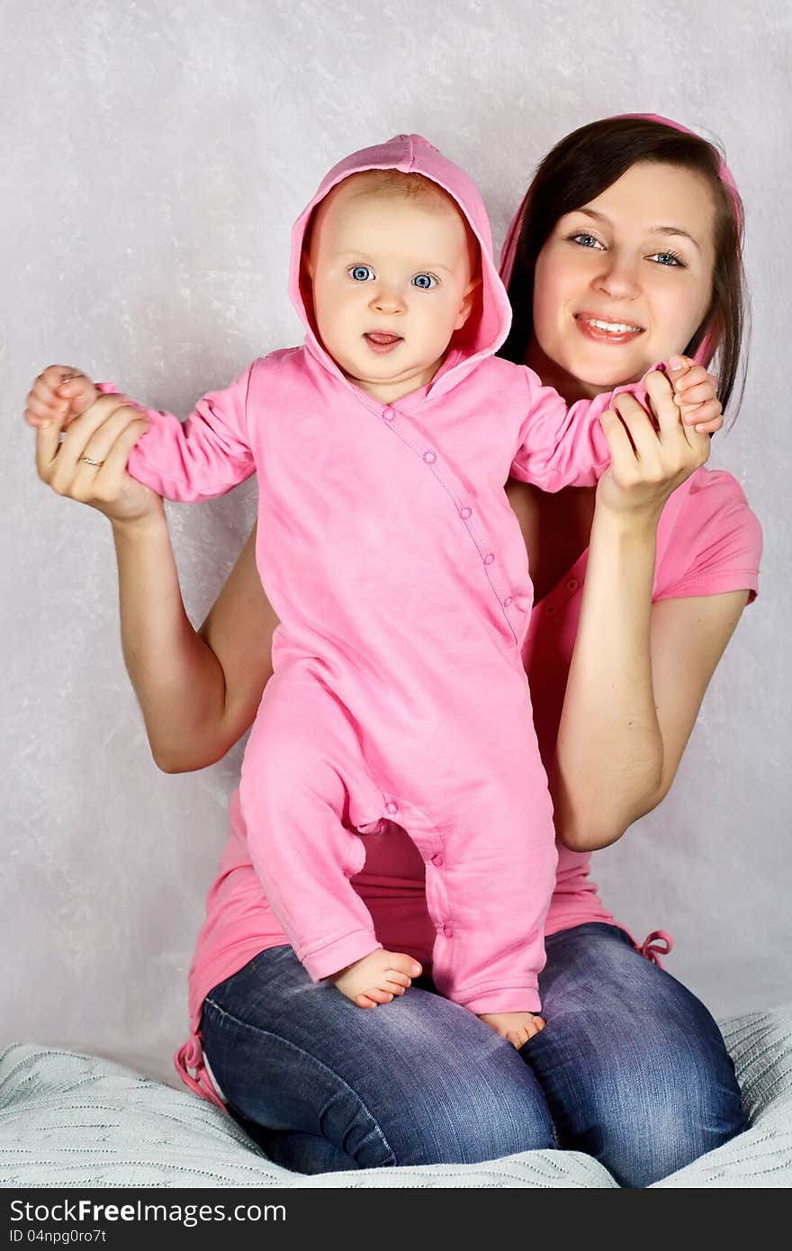 Happy mother with baby girl