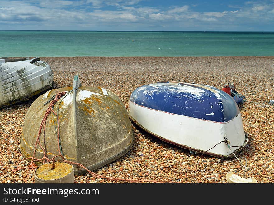 Three Boats On The Beach Upside-down