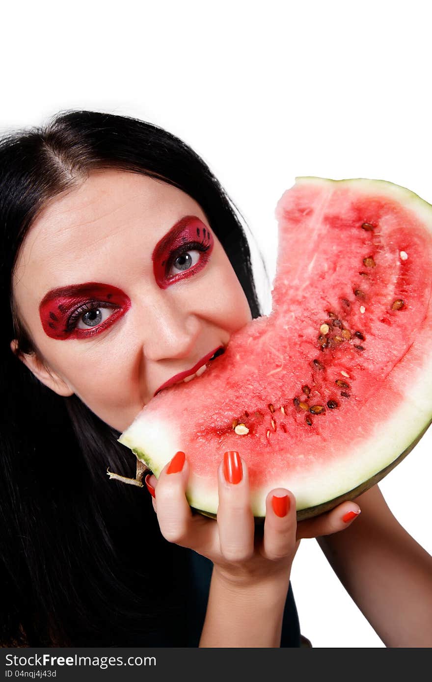 Portrait of a girl eating a watermelon isolated on white background