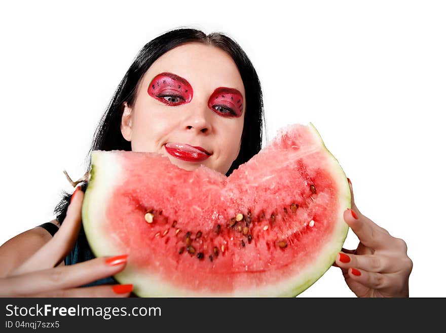 She licks her lips looking at the watermelon isolated