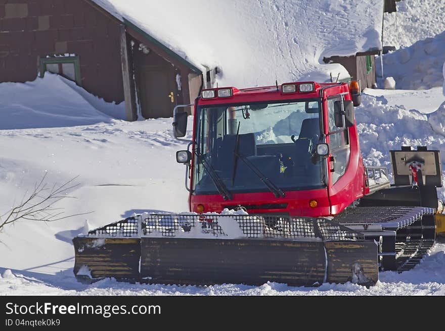 A snow groomer ready to use