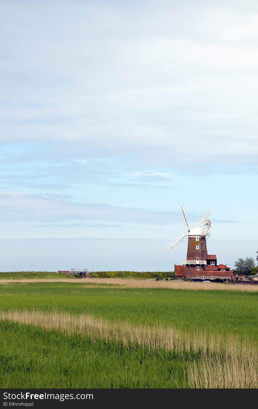 Windmill across marshes at Cley, Norfolk. Windmill across marshes at Cley, Norfolk