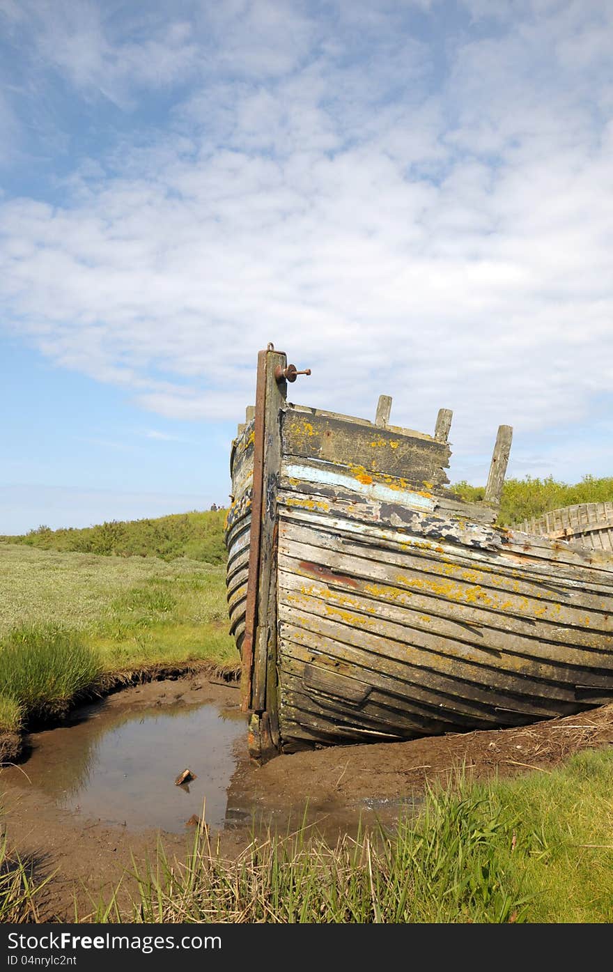 Remains of fishing boat on Norfolk coast at Blakeney. Remains of fishing boat on Norfolk coast at Blakeney