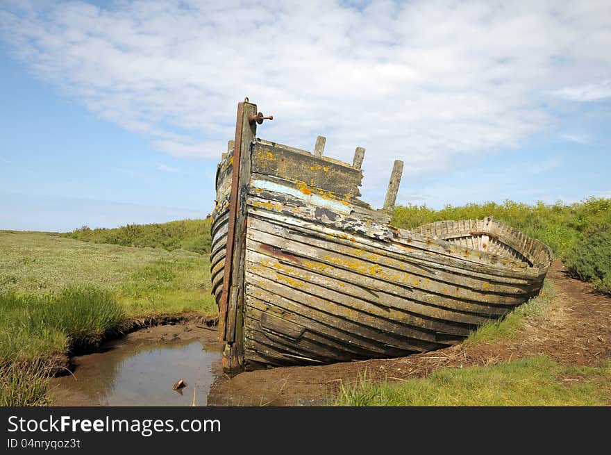 Remains of fishing boat on Norfolk coast at Blakeney. Remains of fishing boat on Norfolk coast at Blakeney