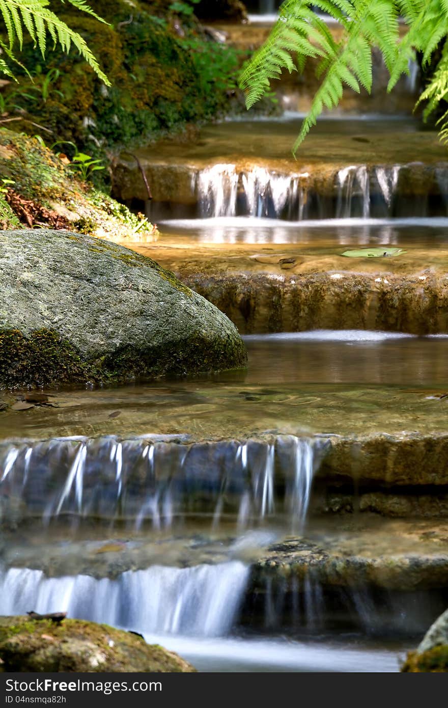 Beautiful veil cascading waterfalls, mossy rocks