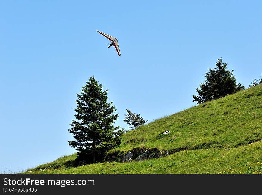 Gliding flying with the background of sky and clouds. Gliding flying with the background of sky and clouds