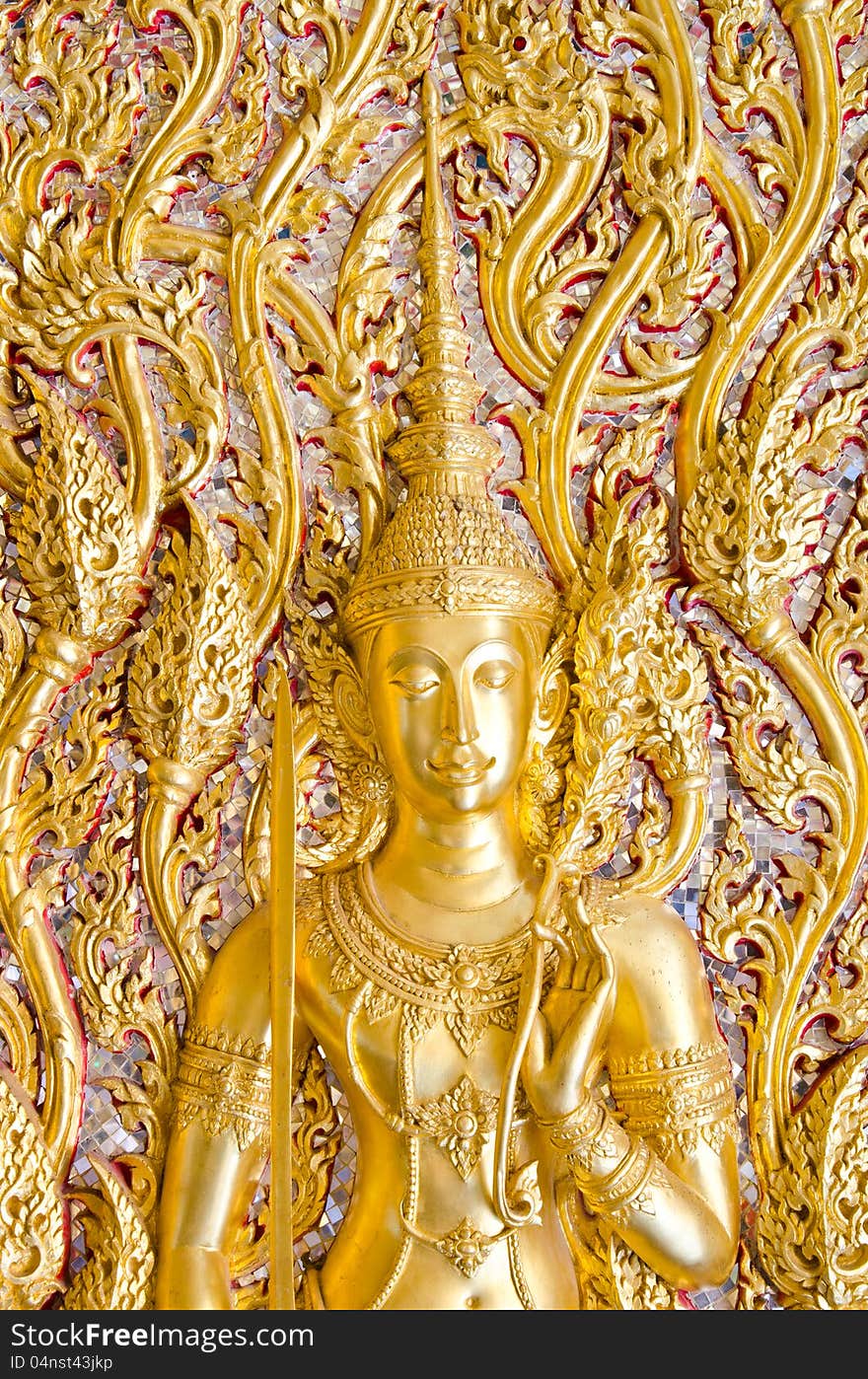 The Angel of Thai stucco covered with gold. The Angel of Thai stucco covered with gold.