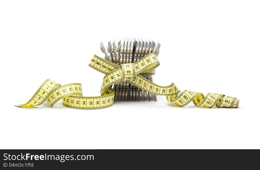 Diet pills with yellow tape measure