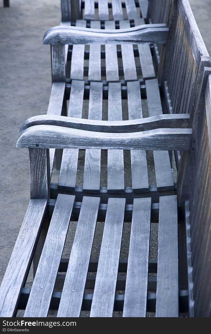 Detail of gray wooden benches