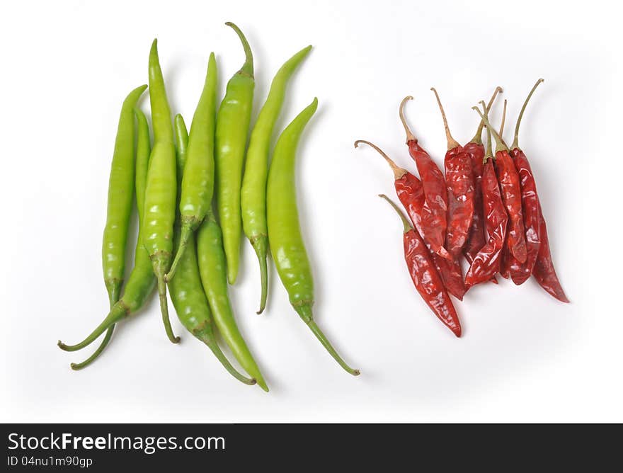 A bunch of hot and spicy dry red and green chillies