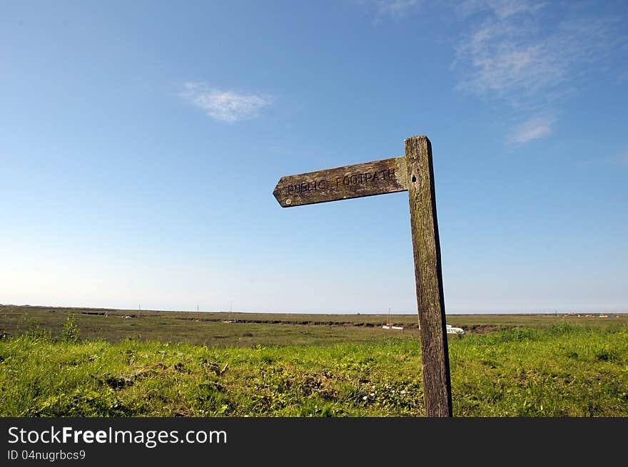 Signpost in the marshes on North Norfolk coastal path. Signpost in the marshes on North Norfolk coastal path