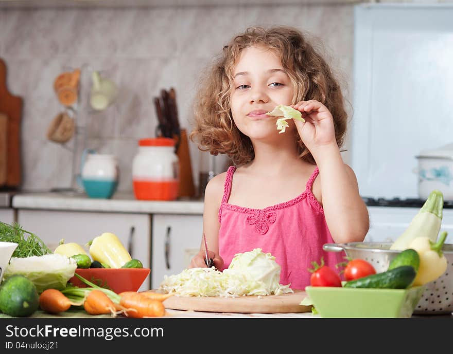 Girl preparing healthy food vegetable salad